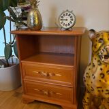 Vintage bedside table with floral decor