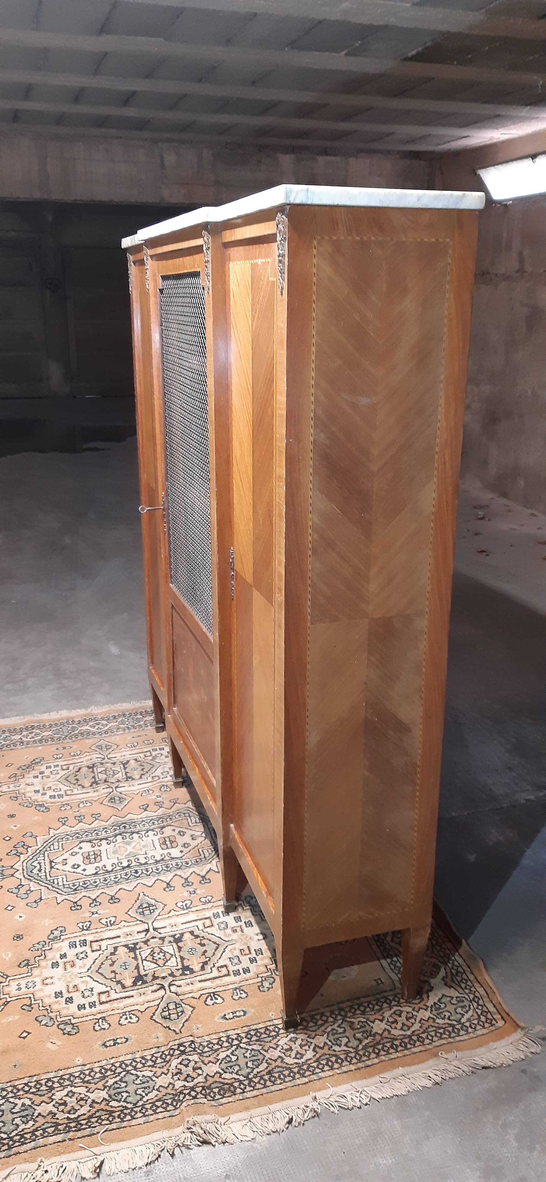 Louis XVI library with marble and precious wood marquetry circa 1850.