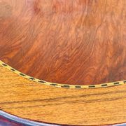 Commode style Louis XV en loupe d'orme et noyer