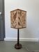 Turned wooden lamp with vintage herbarium lampshade