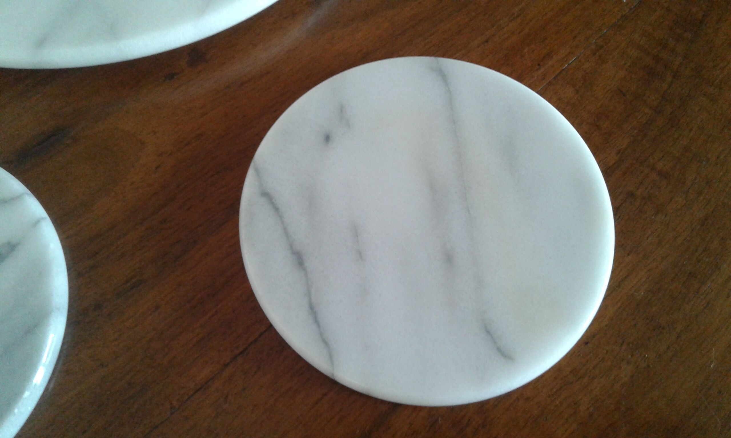 Set under dish and 2 under marble bottle