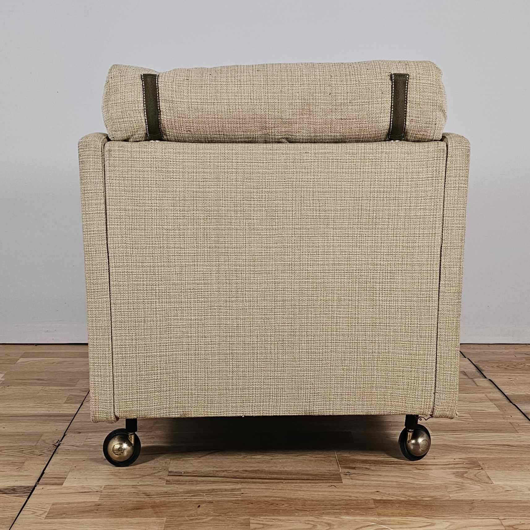 Steiner-Paris, green cloth armchair and ottoman, circa 1950/1960