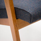 A pair of 300-138 armchairs from the 60s