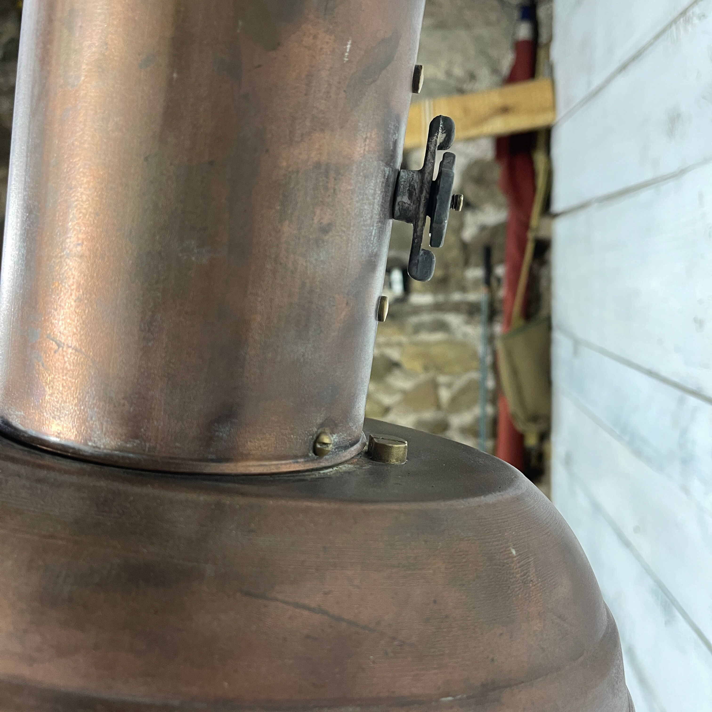 Wall lamp in copper and brass