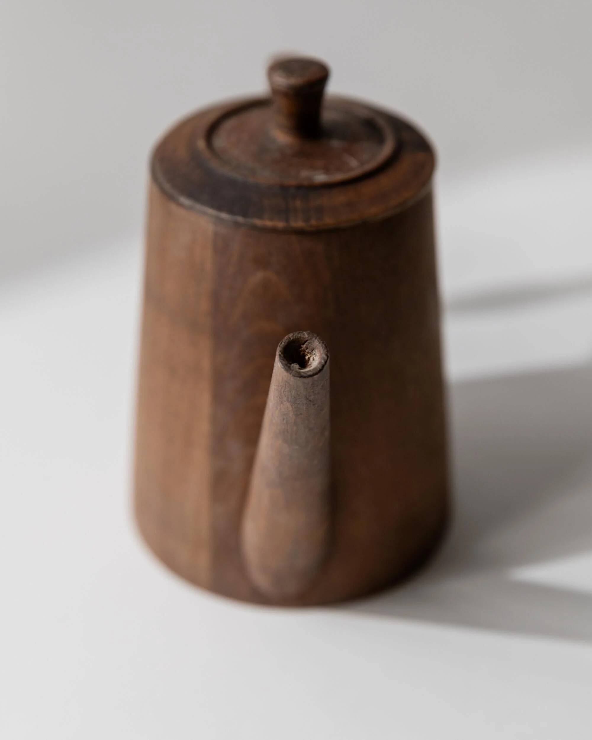 Vintage wooden pitcher from the 1960s, hand-carved.