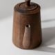 Vintage wooden pitcher from the 1960s, hand-carved.
