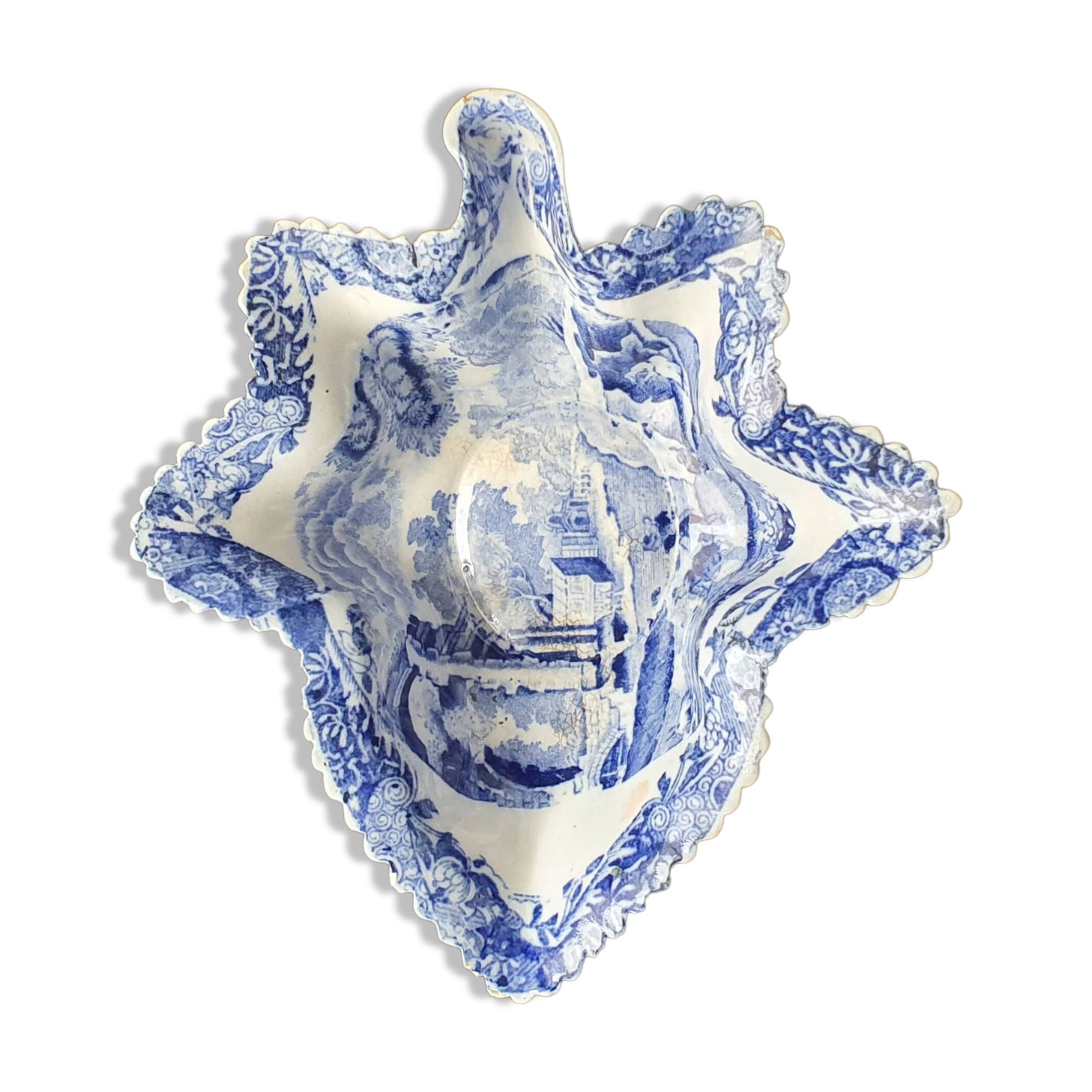 Copeland pickle dish in the shape of a leaf in blue earthenware.