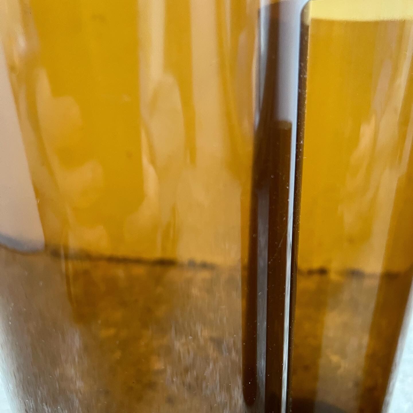 4 Jacques Bédat trundle vases in smoked plexiglass