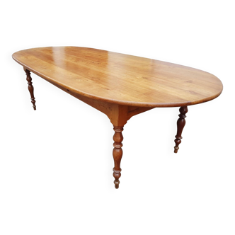 Large old 19th century oval table in cherry wood