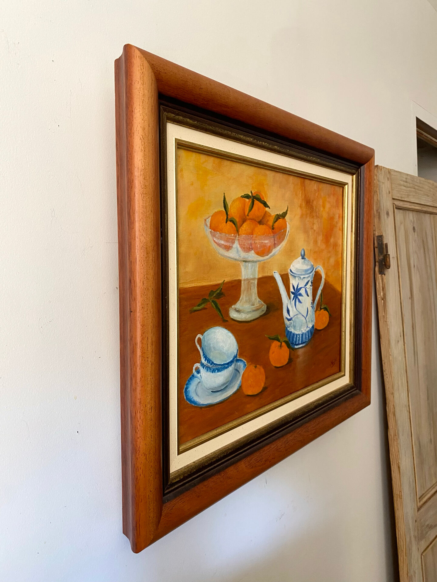 Still life with mandarins and blue pottery, oil on canvas