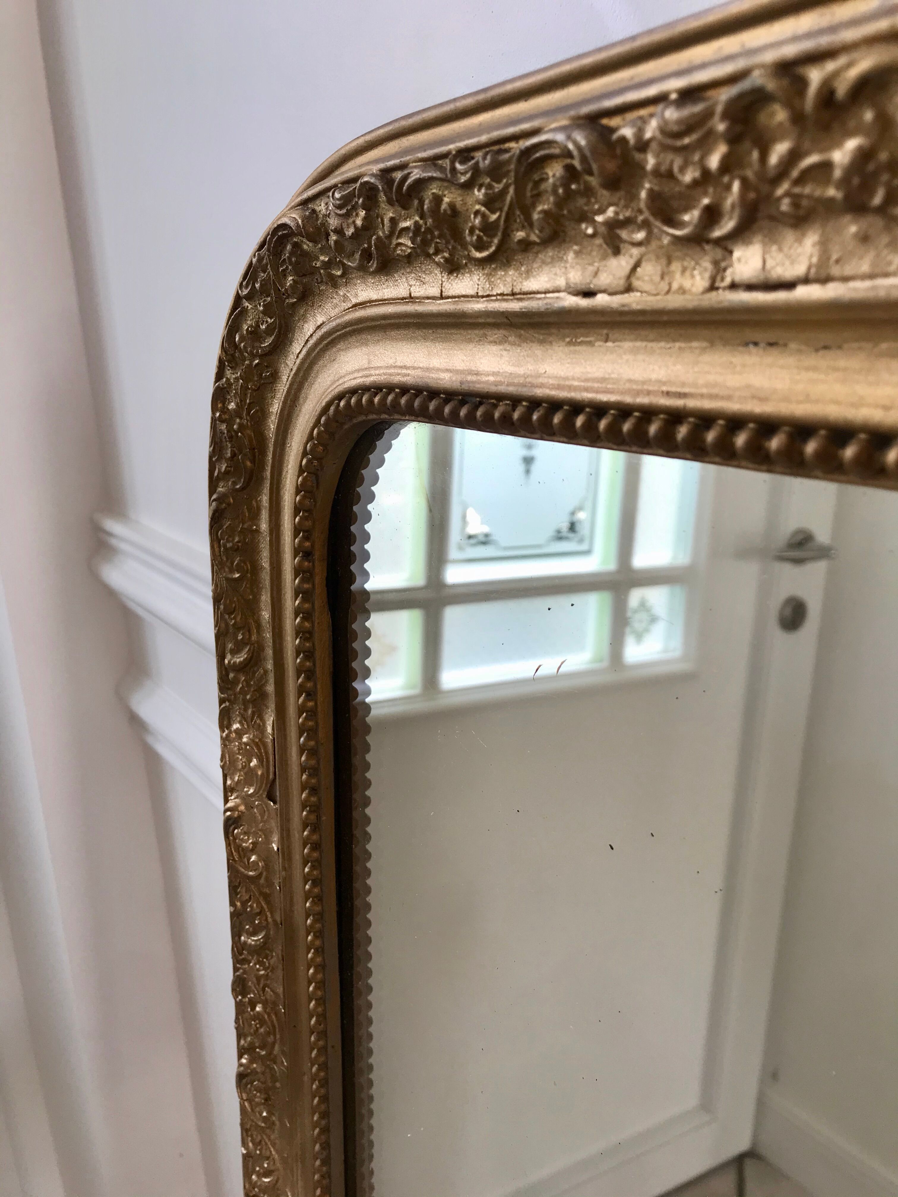 Wooden mirror and gilded stucco early twentieth century