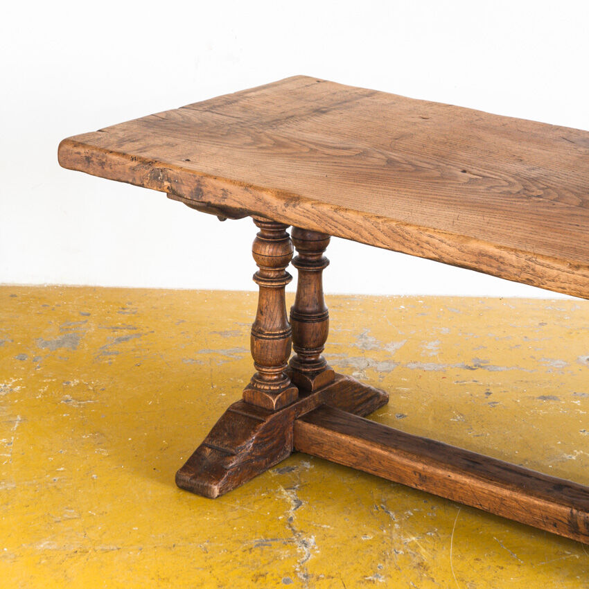 Old coffee table in solid oak wood. France, early twentieth century.
