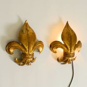 A pair of large 1970s gilt metal Fleur-de-Lis wall lamps by Hans Kögl