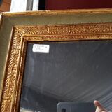 Miroir d'époque Empire rechampi en vert et doré  vers 1805