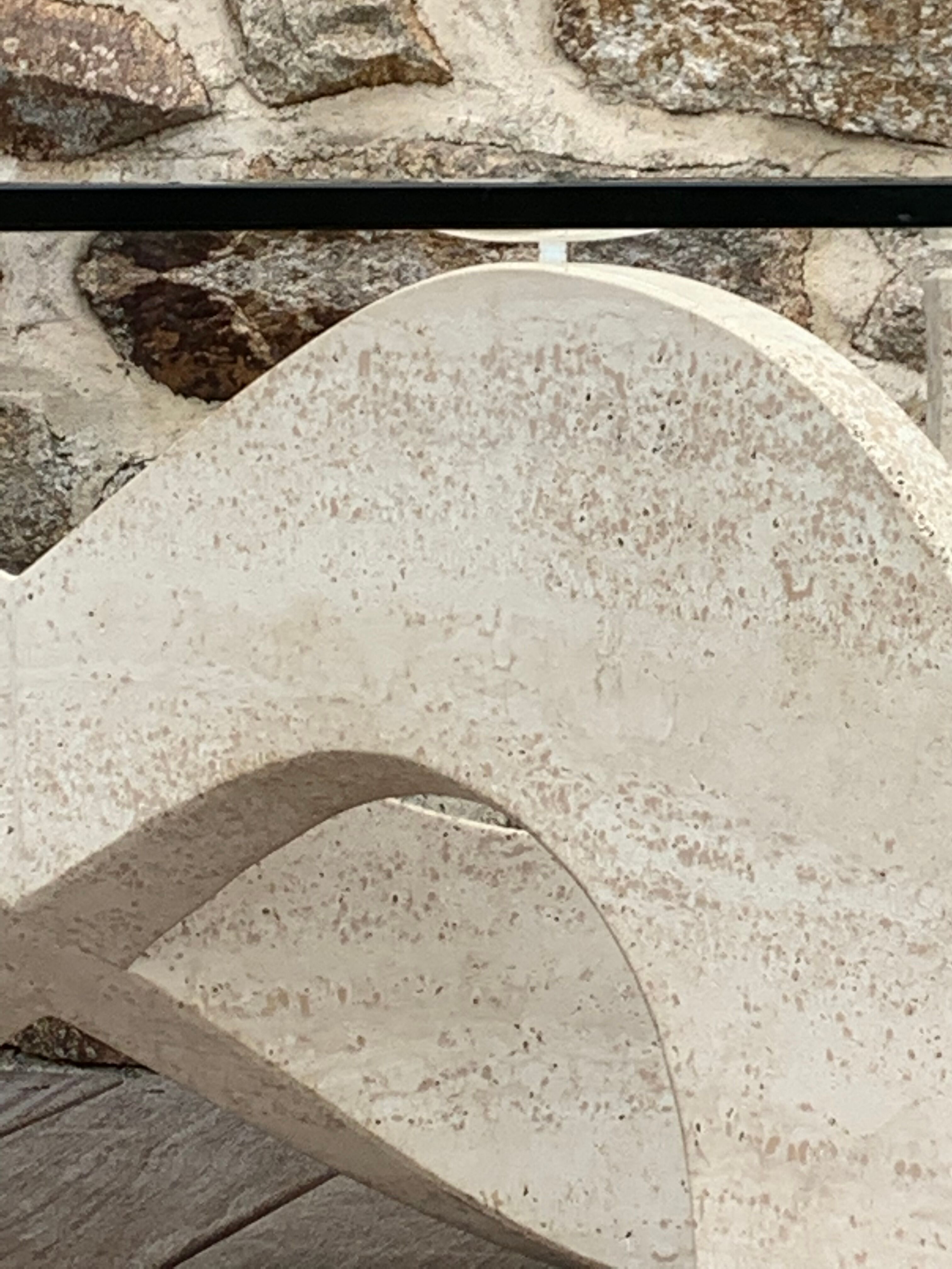 Trendy coffee table in glass and travertine