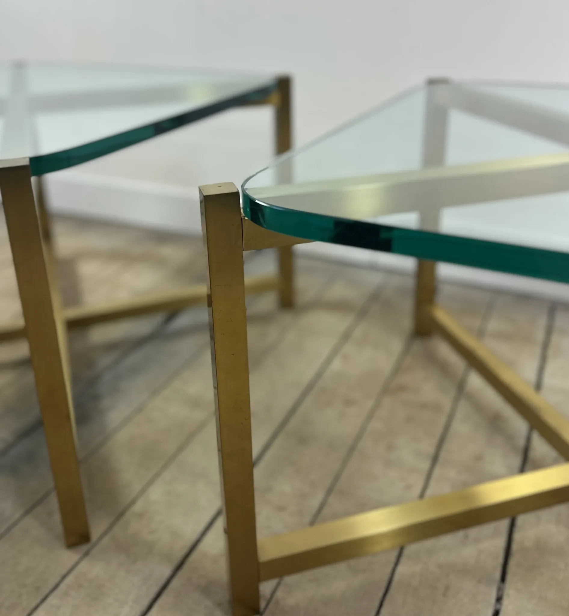 Pair of Italian brass and glass side tables from the 1970s.