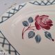 Oval dish in half-porcelain Badonviller red pink decoration and light gray blue braces