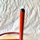 Vintage folding chair in red painted metal and wood