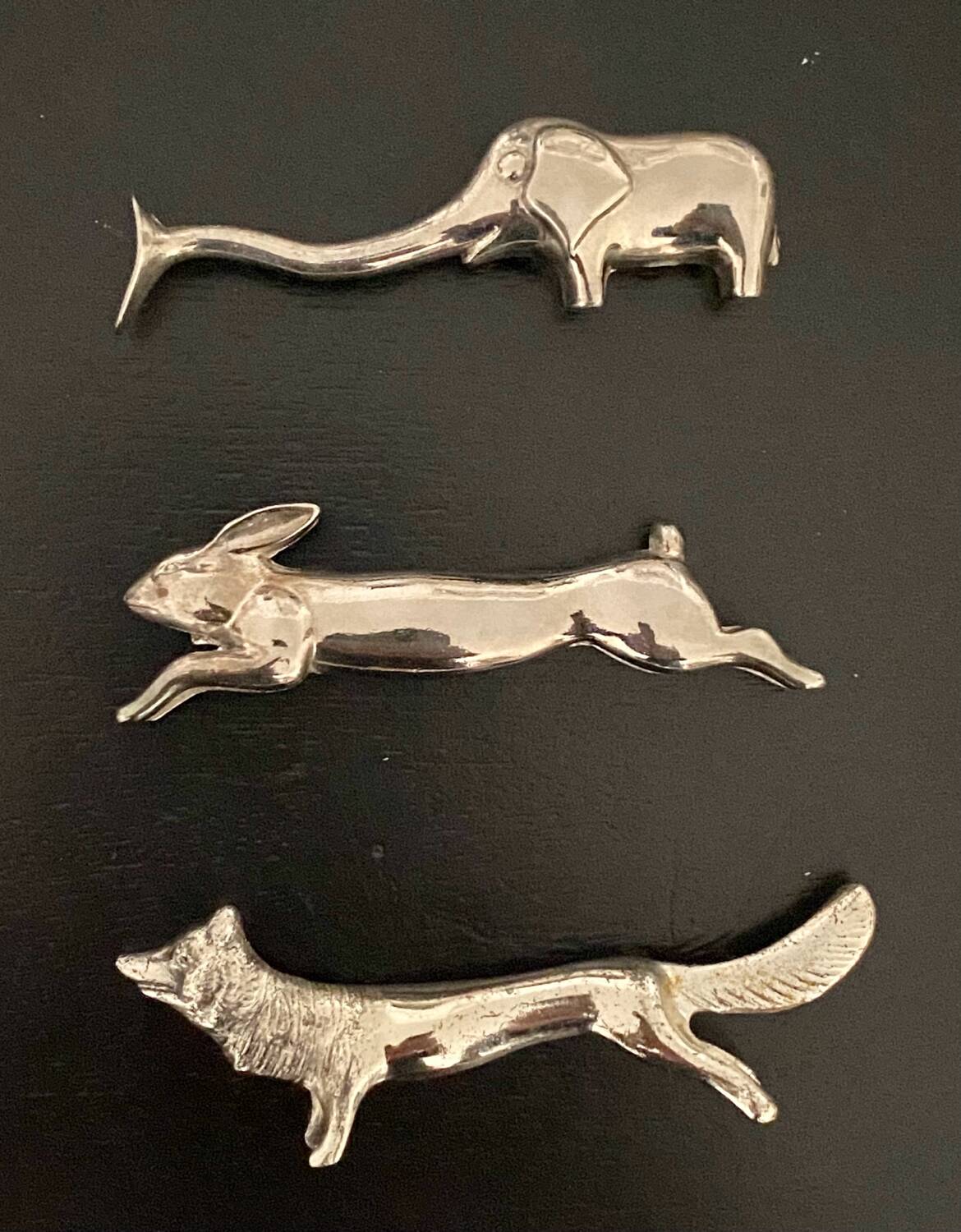 6 various animal shaped knife holders in silver metal