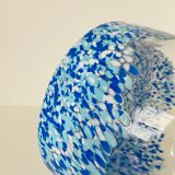 Cylindrical vase with handles in colorless glass splashed with blue and white in the lower part