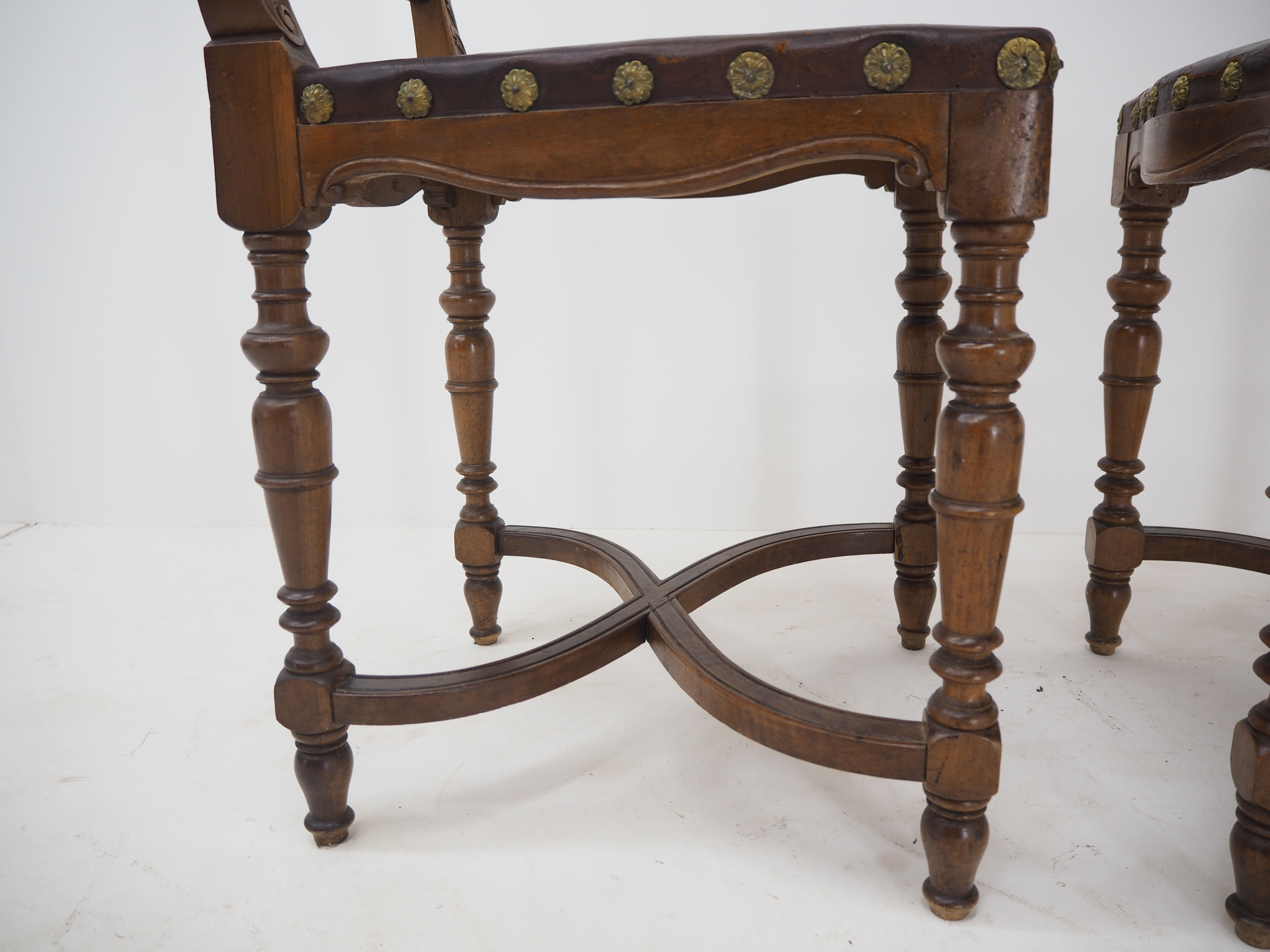 Pair of Antique Embossed Leather Chairs