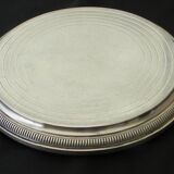 Silver-plated trivet.