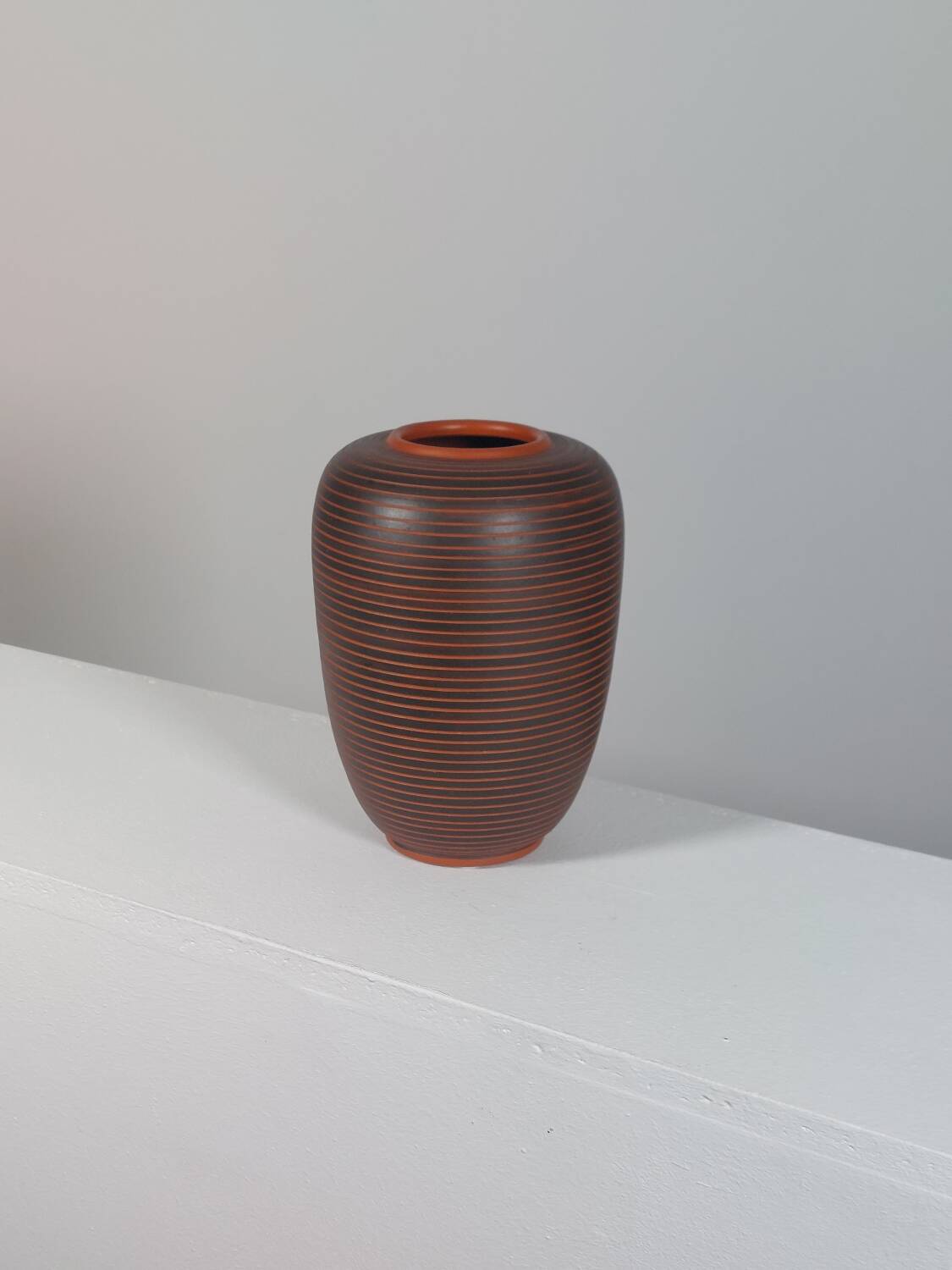 Ceramic vase decorated with vintage sgraffito by Rudi Stahl.