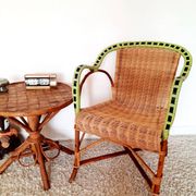 1950s 60s rattan armchair with green apple and black piping.