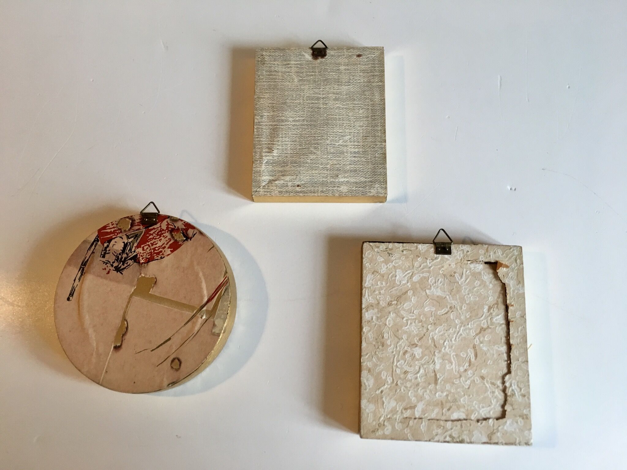 Trio of round golden wood frames and rectangles