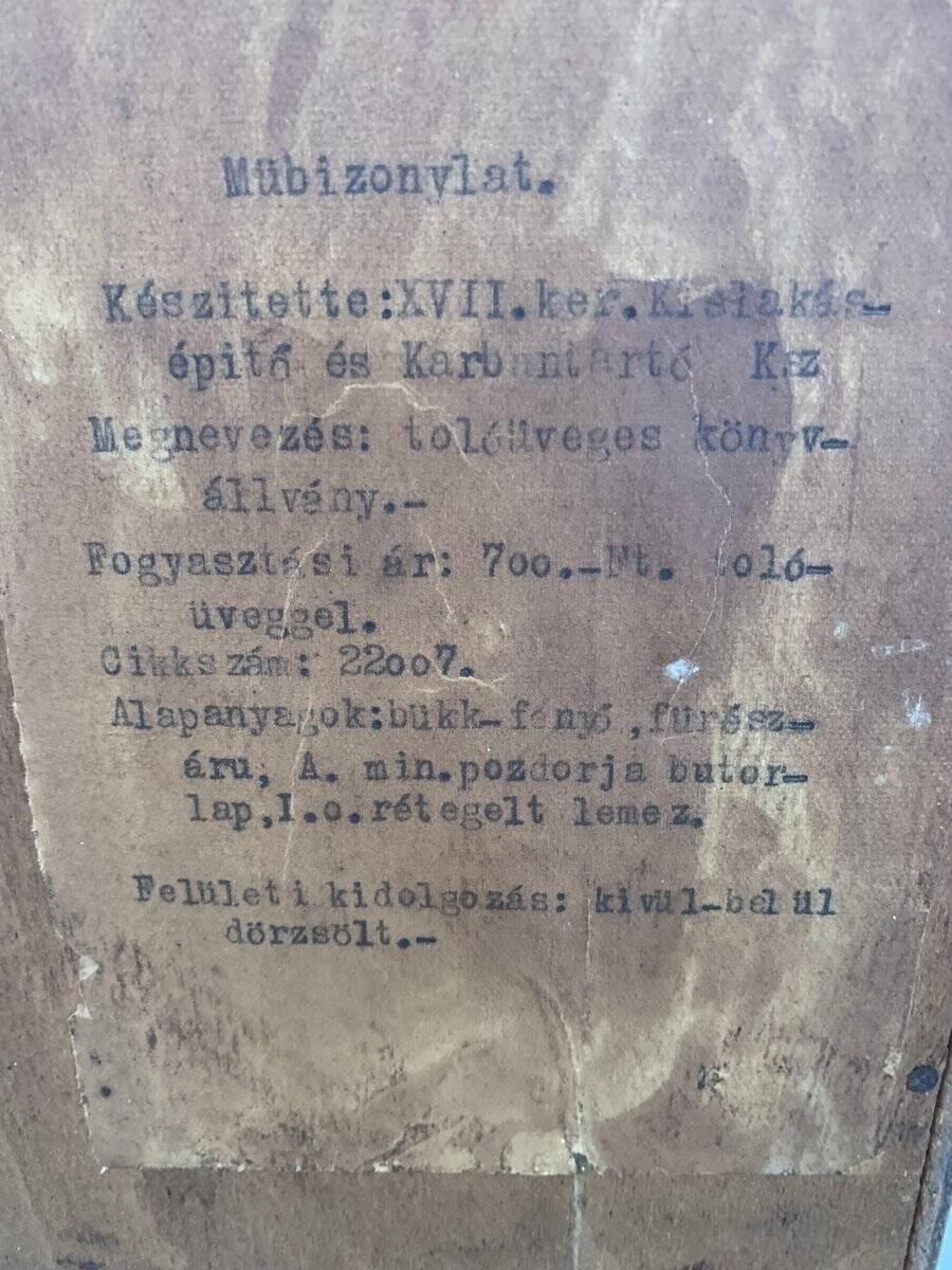 Mid-century brown wooden library (beech & pine) with glass doors from the 1960s.