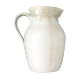 Old decanter in enamelled sandstone