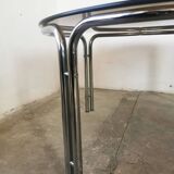 Round chrome and smoked glass coffee table