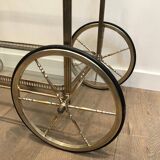 Neoclassical style rolling table in silvered brass