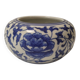 Small round Chinese-style porcelain pot with blue and white decoration