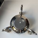 Candle holder in silver-plated metal, lotus shape.