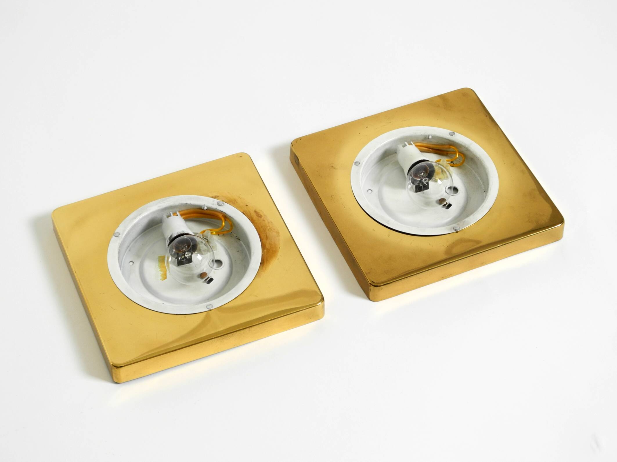 Two 1970s brass wall lamps by Rolf Krüger for Heinz Neuhaus Leuchten