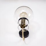 Wall lights with blown glass globes.