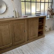 Large row of solid oak loom sliding doors