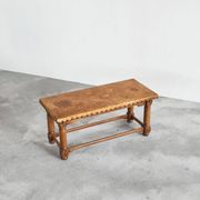Brutalist coffee table in solid oak, metal, and patinated leather, 1940s.