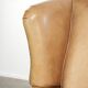 Set of two light cowhide wingback armchairs with a timeless English look
