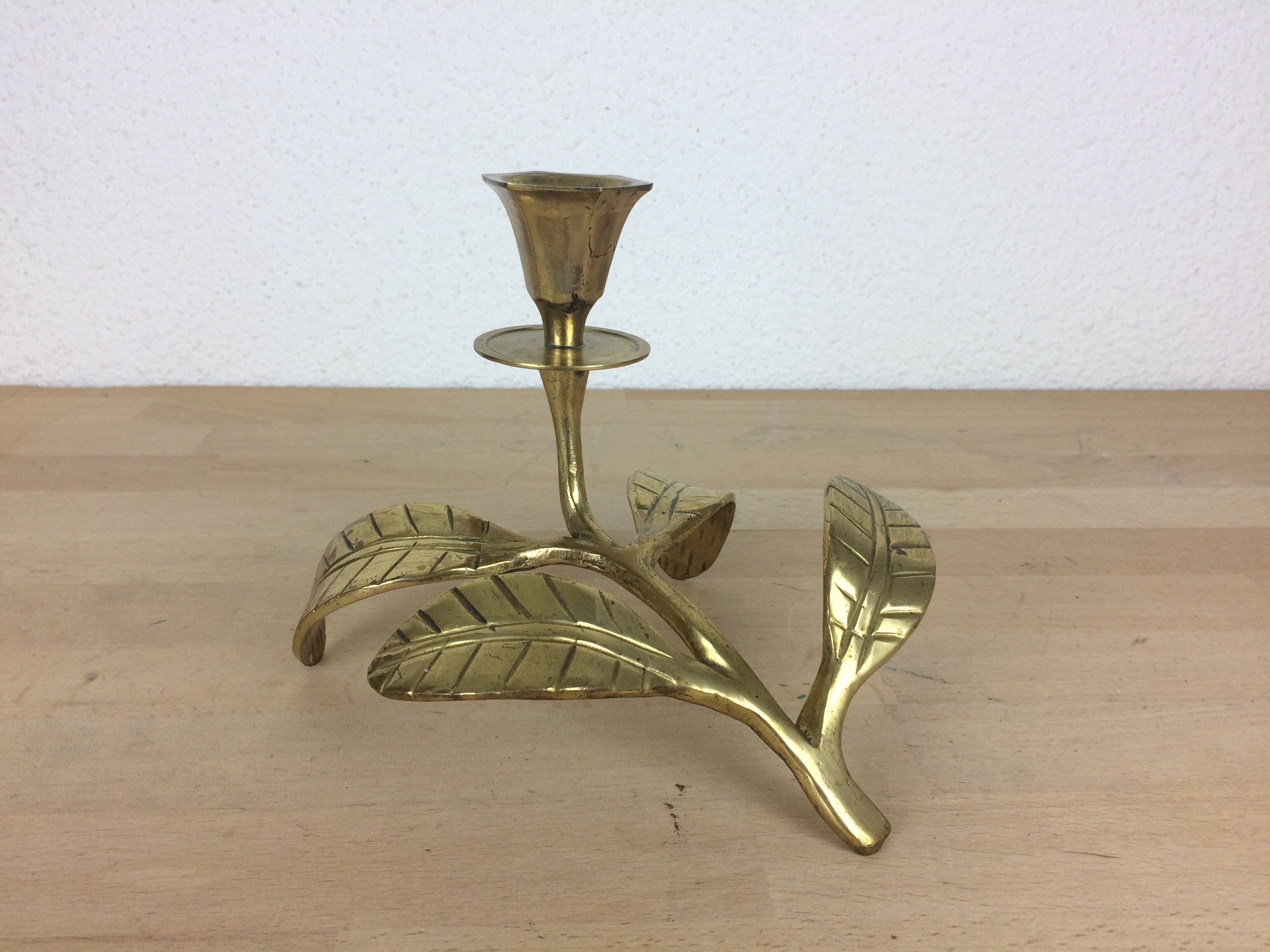 Candle holder flower leaves in golden brass