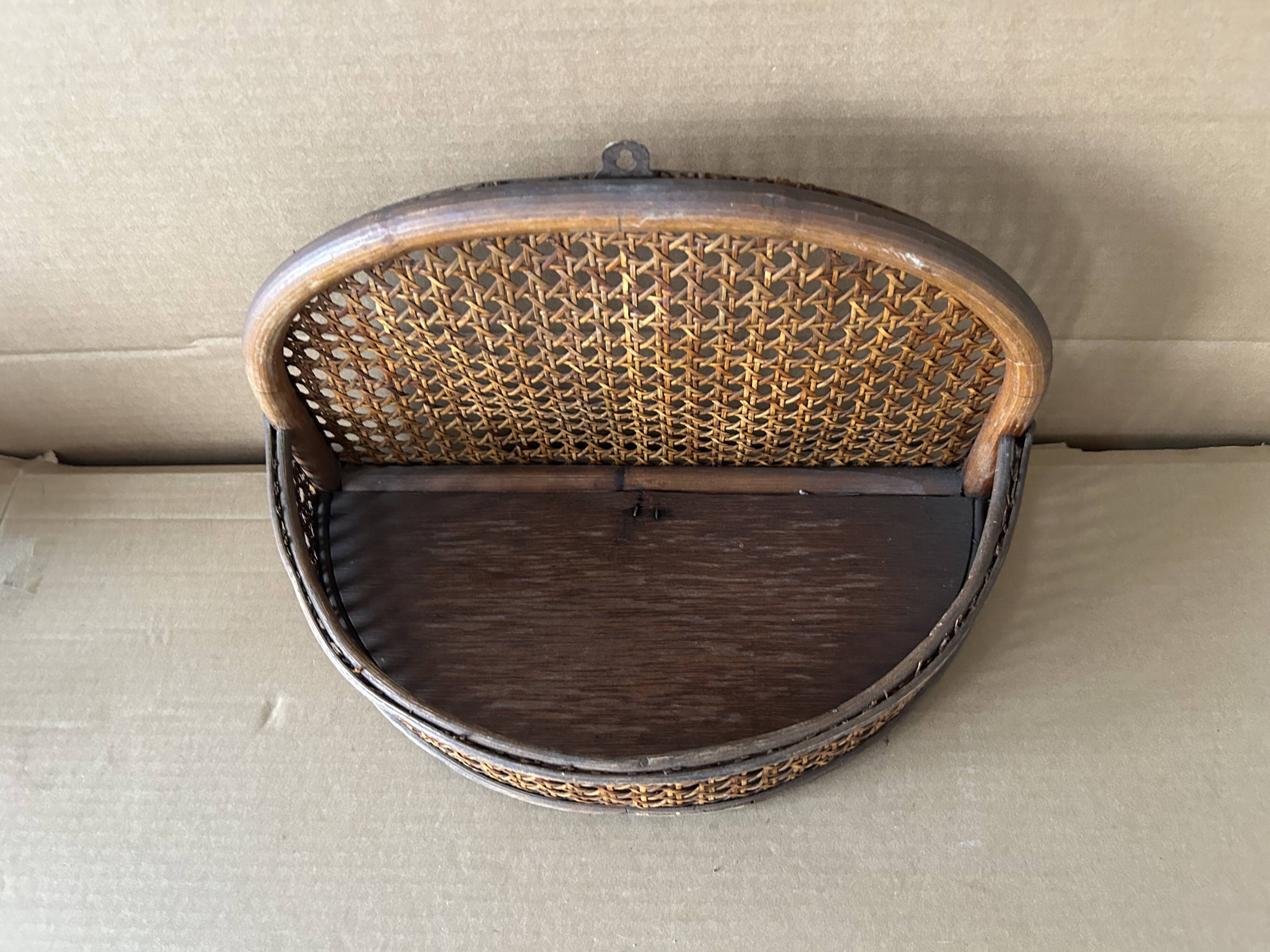 Antique cane wall shelf