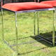 4 Chrome chairs in vintage orange velvet