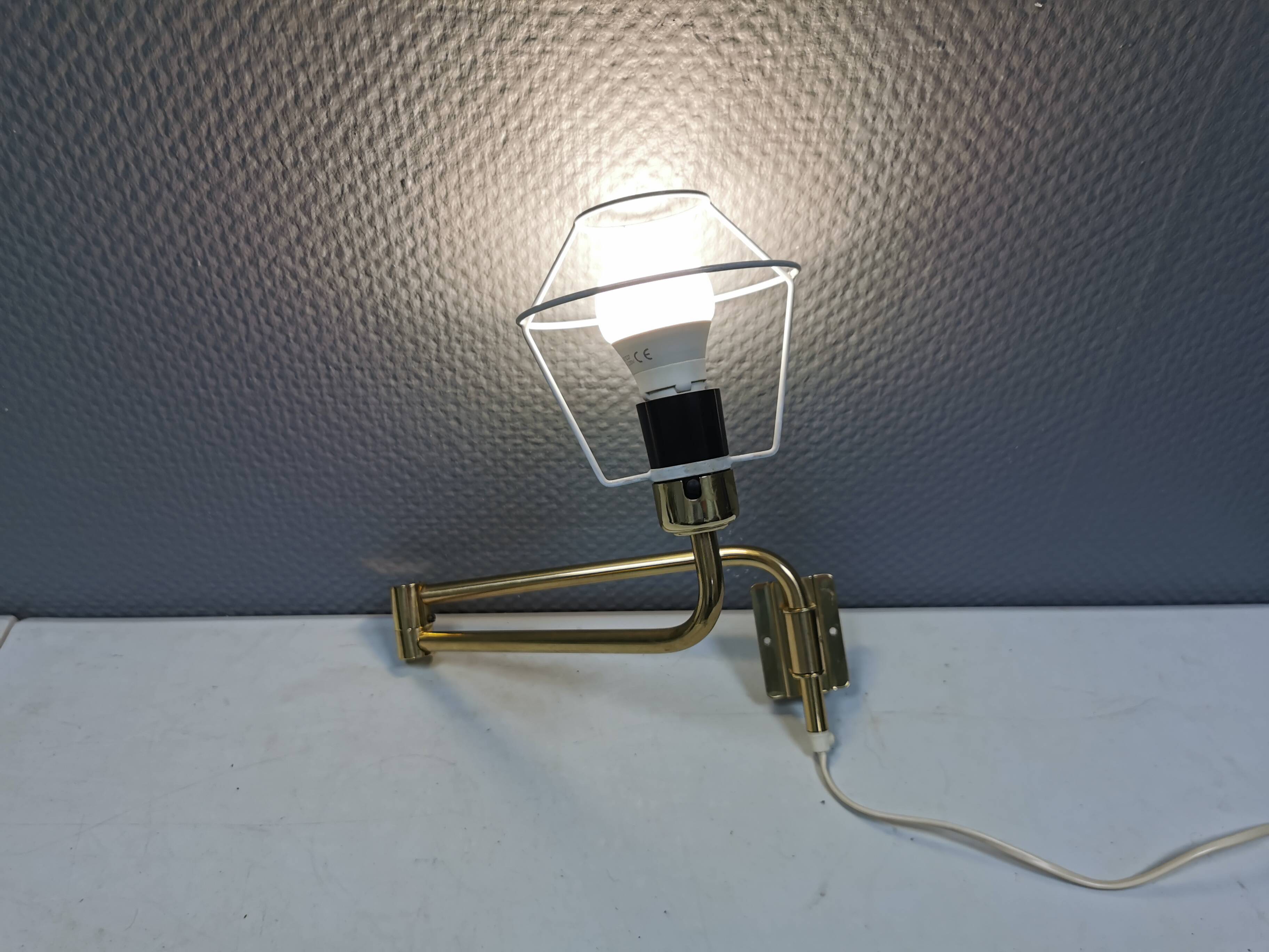 Danish “swing arm” wall lamp in brass by Lyskaer Lightning (LB) 1980s.