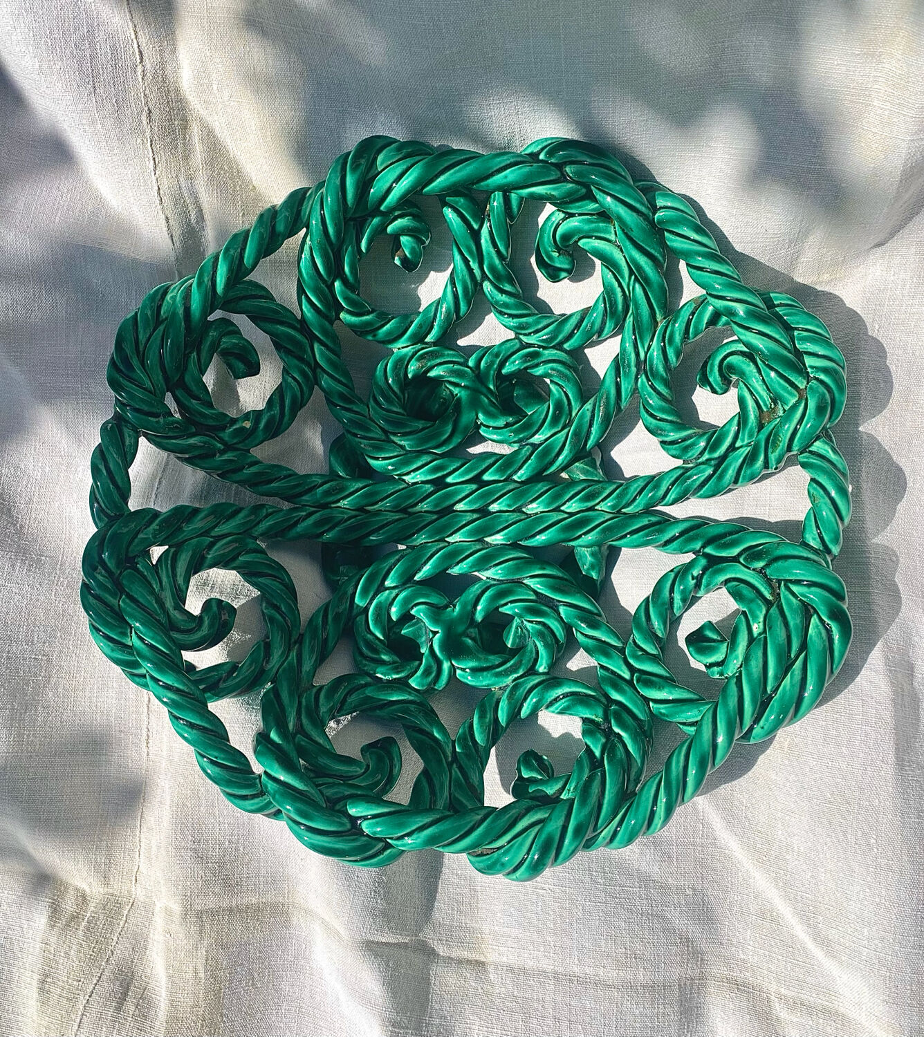 Large twisted green enamelled bowl
