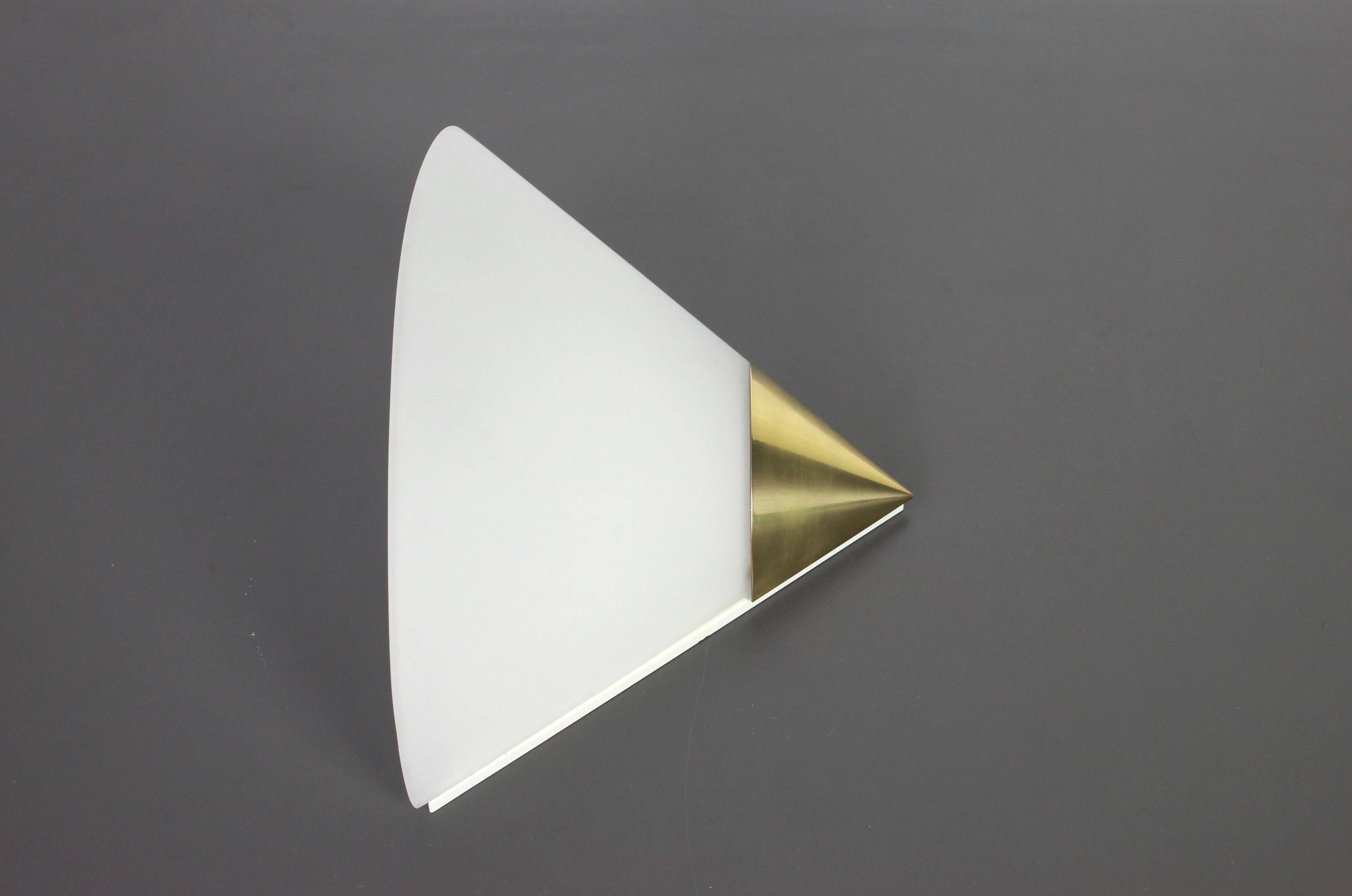 Pair of opaline glass wall lights designed by Limburg, Germany.