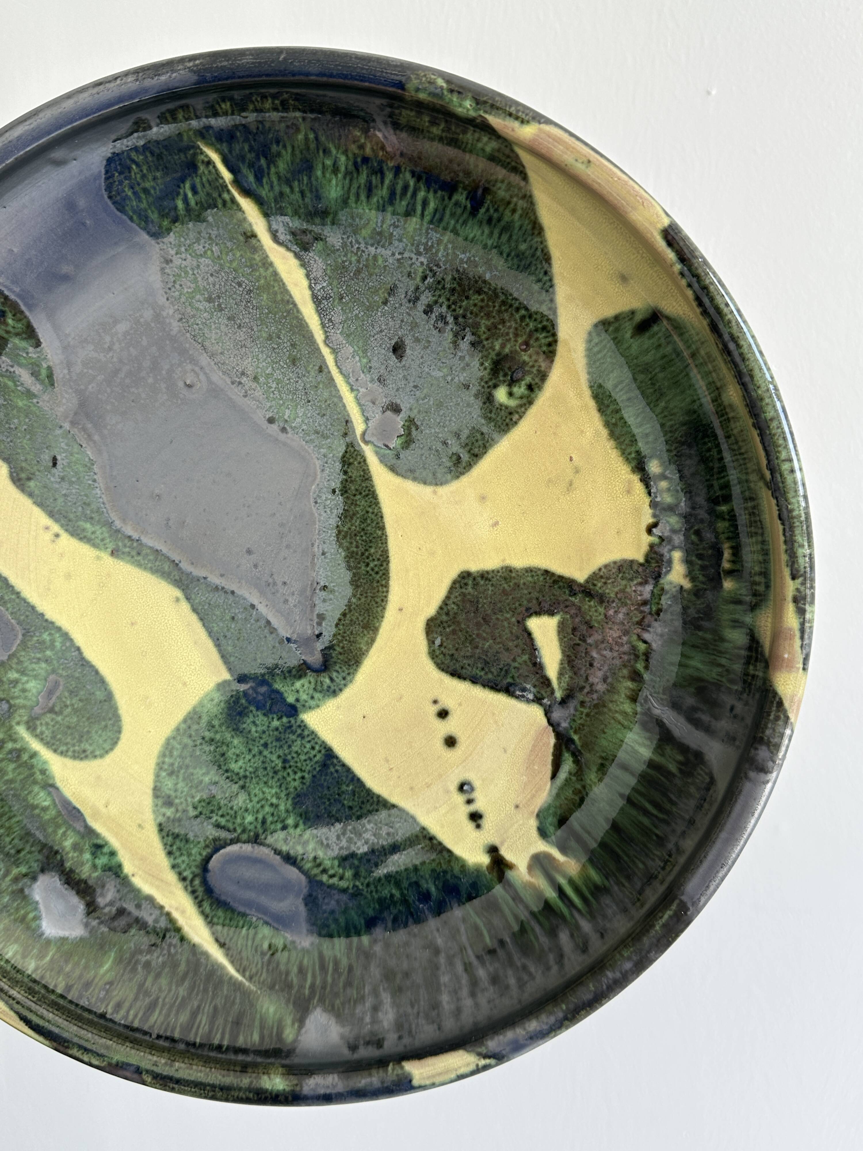 large colored terracotta ceramic dish