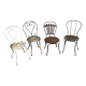 Mélange of vintage garden chairs