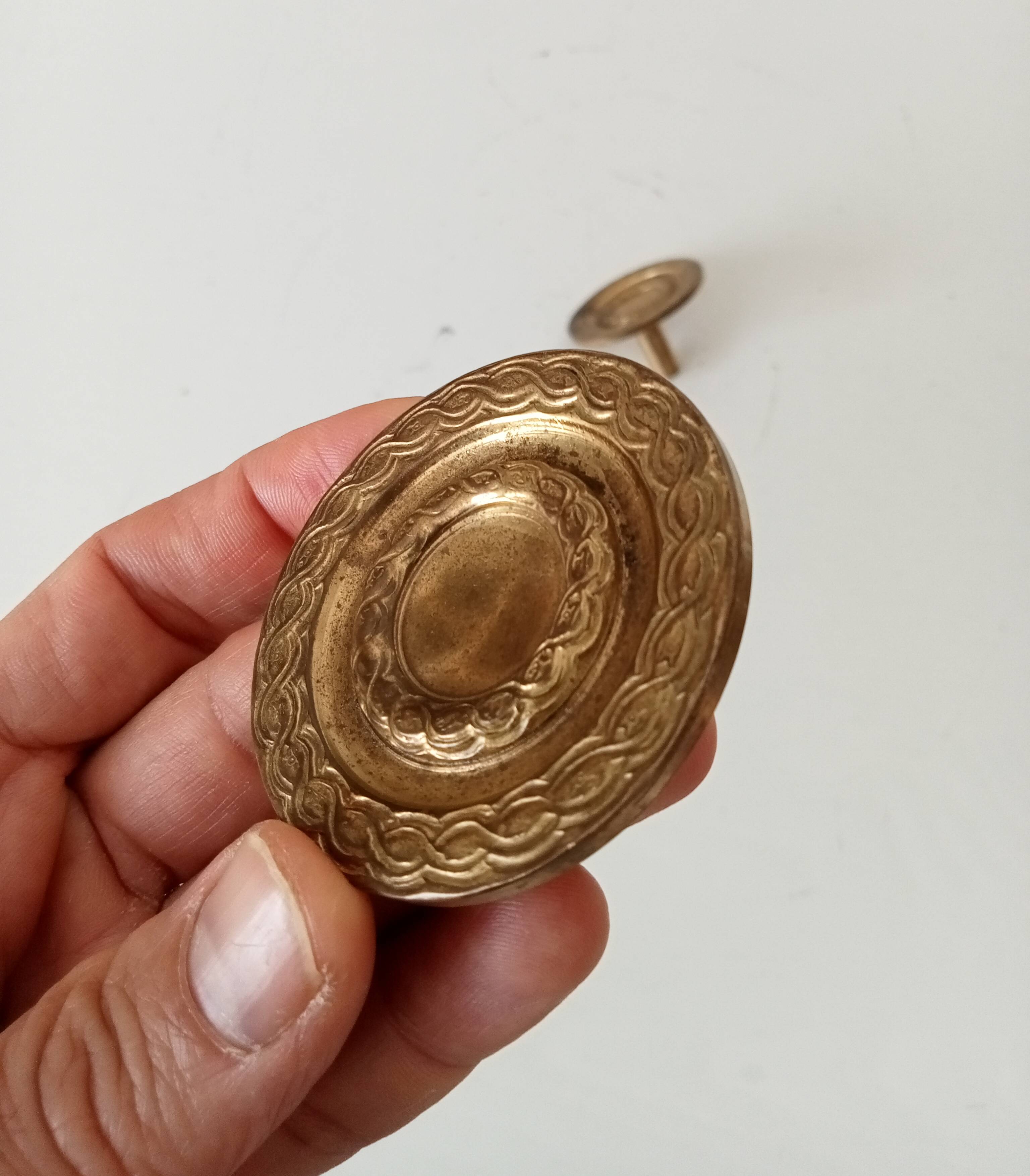 Antique Empire-style furniture handle in solid gilded bronze.