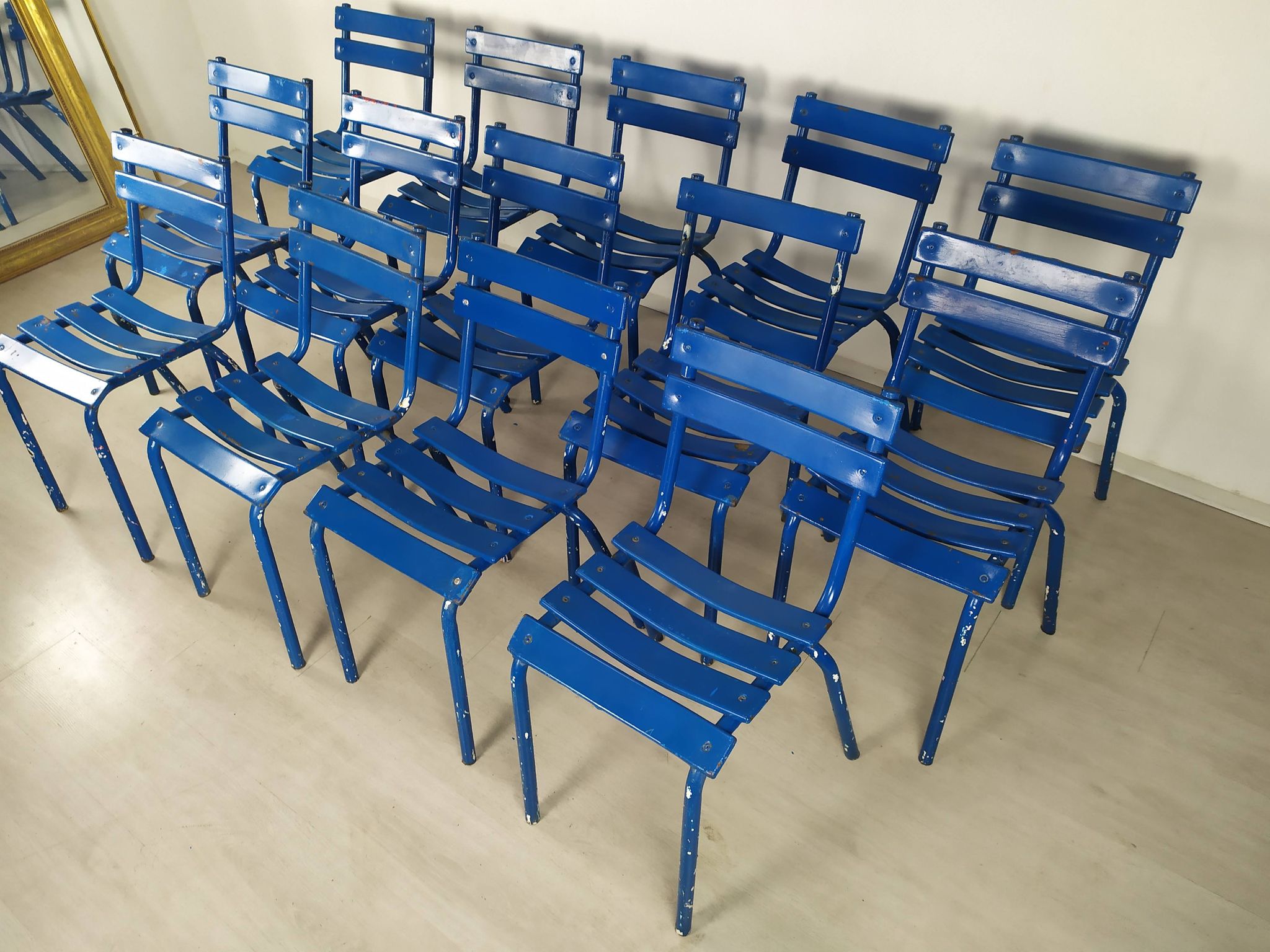 14 blue metal bistro chairs